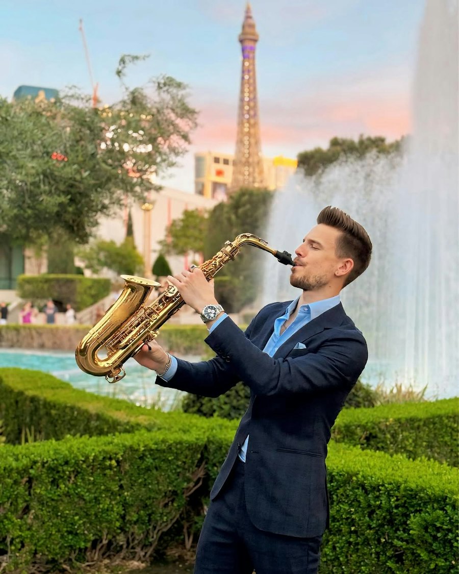 Dan Goode playing saxophone outdoors in Las Vegas
